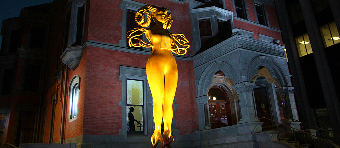Ballantine House statue and portico at night